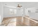 Bright living room with hardwood floors, neutral walls, and plenty of natural light at 3220 Capitol Dr, Charlotte, NC 28208