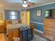 Bedroom with wood flooring, and a dresser at 3720 Fairlane Dr, Gastonia, NC 28056