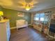 bedroom with green walls and wood floors at 3720 Fairlane Dr, Gastonia, NC 28056