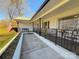 Inviting front porch with metal railings, swing, and ample seating at 3720 Fairlane Dr, Gastonia, NC 28056