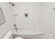 Bathroom with white subway tile, a niche, and a tub and shower combo at 3828 Chandworth Rd, Charlotte, NC 28210