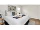 Comfortable bedroom featuring bright white walls and soft natural light at 3828 Chandworth Rd, Charlotte, NC 28210