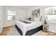 Comfortable bedroom featuring bright white walls and soft natural light at 3828 Chandworth Rd, Charlotte, NC 28210