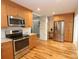 Modern kitchen with stainless steel appliances and ample cabinet space at 3828 Chandworth Rd, Charlotte, NC 28210