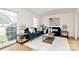 Cozy living room features two navy sofas and an area rug at 3828 Chandworth Rd, Charlotte, NC 28210