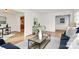 Inviting living room featuring hardwood floors and plenty of natural light at 3828 Chandworth Rd, Charlotte, NC 28210