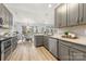 Modern kitchen with gray cabinets and granite countertops at 3903 Bon Rea Dr, Charlotte, NC 28226