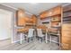 Functional home office with wood cabinets and a large desk at 3903 Bon Rea Dr, Charlotte, NC 28226