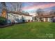 Spacious backyard featuring a well-maintained lawn, ideal for outdoor activities and relaxation at 401 Kenwood Ave, Cherryville, NC 28021