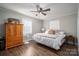 Spacious bedroom with wood floors and a king-size bed at 401 Kenwood Ave, Cherryville, NC 28021