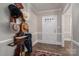 Inviting entryway with hardwood floors and antique hat stand at 401 Kenwood Ave, Cherryville, NC 28021