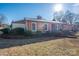 Brick ranch house with mature landscaping at 401 Kenwood Ave, Cherryville, NC 28021