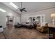 Sunroom with L-shaped sectional sofa and view of kitchen at 401 Kenwood Ave, Cherryville, NC 28021