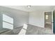 Spacious bedroom with access to another room at 5036 Heathland Dr # 71, Charlotte, NC 28215