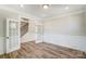 Spacious dining room with hardwood floors and French doors at 5036 Heathland Dr # 71, Charlotte, NC 28215