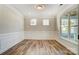 Formal dining room with wainscoting and hardwood floors at 5036 Heathland Dr # 71, Charlotte, NC 28215