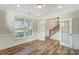 Elegant dining room, hardwood floors, and French doors at 5036 Heathland Dr # 71, Charlotte, NC 28215