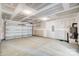 Unfinished garage with automatic door opener at 5036 Heathland Dr # 71, Charlotte, NC 28215