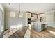 Modern kitchen with an island, stainless steel appliances, and white cabinets at 5036 Heathland Dr # 71, Charlotte, NC 28215