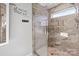 Modern bathroom with walk-in shower, double vanity, and decorative tile at 505 Viking Sw Dr, Concord, NC 28025