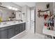 Main bathroom with double vanity and separate toilet at 505 Viking Sw Dr, Concord, NC 28025