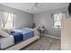 Bedroom with a bed and a desk, featuring gray walls at 505 Viking Sw Dr, Concord, NC 28025