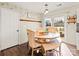 Bright dining room with wooden table and four chairs at 505 Viking Sw Dr, Concord, NC 28025