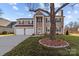 Two story house with large front yard and two car garage at 505 Viking Sw Dr, Concord, NC 28025