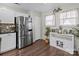 Kitchen with stainless steel refrigerator and white cabinets at 505 Viking Sw Dr, Concord, NC 28025