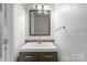 Simple bathroom with vanity and mirror at 5190 Corbin Ln, Hickory, NC 28601