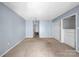 Large bedroom with multiple closets and access to a hallway at 5190 Corbin Ln, Hickory, NC 28601