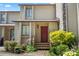 Charming townhouse featuring well-maintained landscaping and a cozy front entrance at 5190 Corbin Ln, Hickory, NC 28601