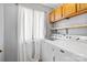 Laundry room with washer, dryer, and overhead cabinets at 5190 Corbin Ln, Hickory, NC 28601