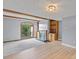 Bright living room featuring hardwood floors, fireplace, and sliding glass doors at 5190 Corbin Ln, Hickory, NC 28601