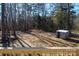 Wooded backyard with a small storage shed at 5966 Quarter Mile Rd # 2, Clover, SC 29710