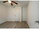 Simple bedroom with grey flooring and a closet at 5966 Quarter Mile Rd # 2, Clover, SC 29710