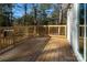 Wooden deck with railing overlooking a wooded backyard at 5966 Quarter Mile Rd # 2, Clover, SC 29710