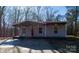 Newly built home with a red front door and covered porch at 5966 Quarter Mile Rd # 2, Clover, SC 29710