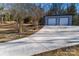 Detached two-car garage with a long driveway at 5966 Quarter Mile Rd # 2, Clover, SC 29710