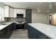 Modern kitchen featuring dark and white cabinets, and an island at 5966 Quarter Mile Rd # 2, Clover, SC 29710