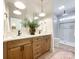 Elegant bathroom with double vanity and modern fixtures at 604 N Providence St, Waxhaw, NC 28173