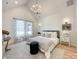 Spacious bedroom with high ceilings and a stylish chandelier at 604 N Providence St, Waxhaw, NC 28173