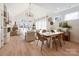 Open concept dining area adjacent to living room and kitchen at 604 N Providence St, Waxhaw, NC 28173