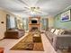 Inviting living room showcasing a traditional fireplace and plush furnishings at 630 N Moran St, Gastonia, NC 28052