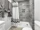 Tiled shower and showerhead at 630 N Moran St, Gastonia, NC 28052