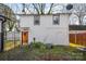 White house with wooden door and plants at 714, 716 Lucas St # 2A, Rock Hill, SC 29730