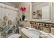 Charming bathroom with a shower/tub combo and updated vanity at 7513 Mariner Cove Dr, Cornelius, NC 28031