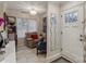 Bright and airy entryway with comfortable seating and stylish decor at 7513 Mariner Cove Dr, Cornelius, NC 28031