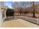 Wooden deck overlooks fenced-in backyard at 7620 Rolling Meadows Ln, Huntersville, NC 28078