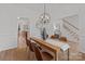 Dining room with chandelier and view of kitchen at 7620 Rolling Meadows Ln, Huntersville, NC 28078